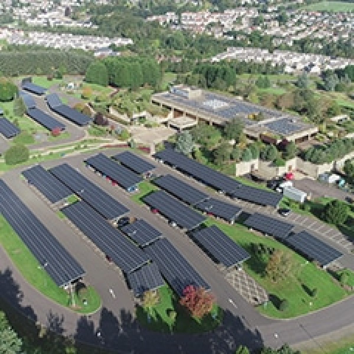 Q CELLS modules power innovative 1 MW solar carport array with EV charging for Aviva, UK image