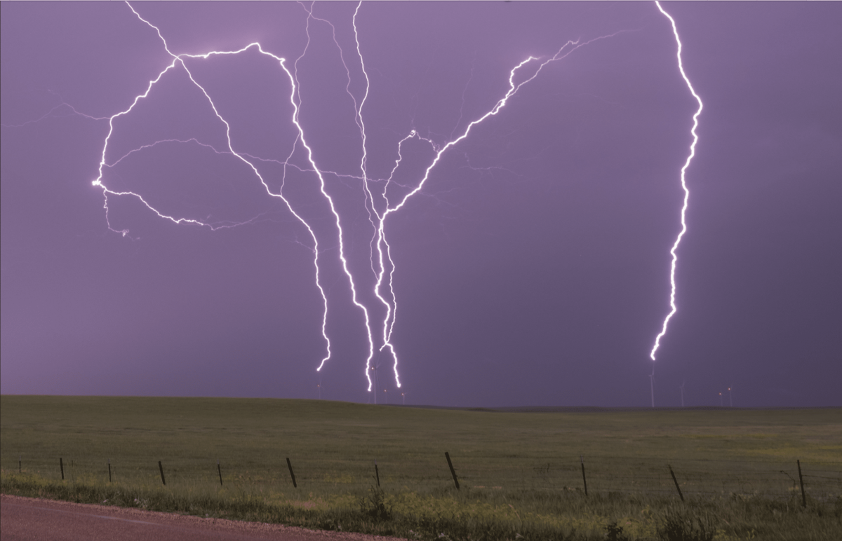 The electrifying dance of upward lightning image