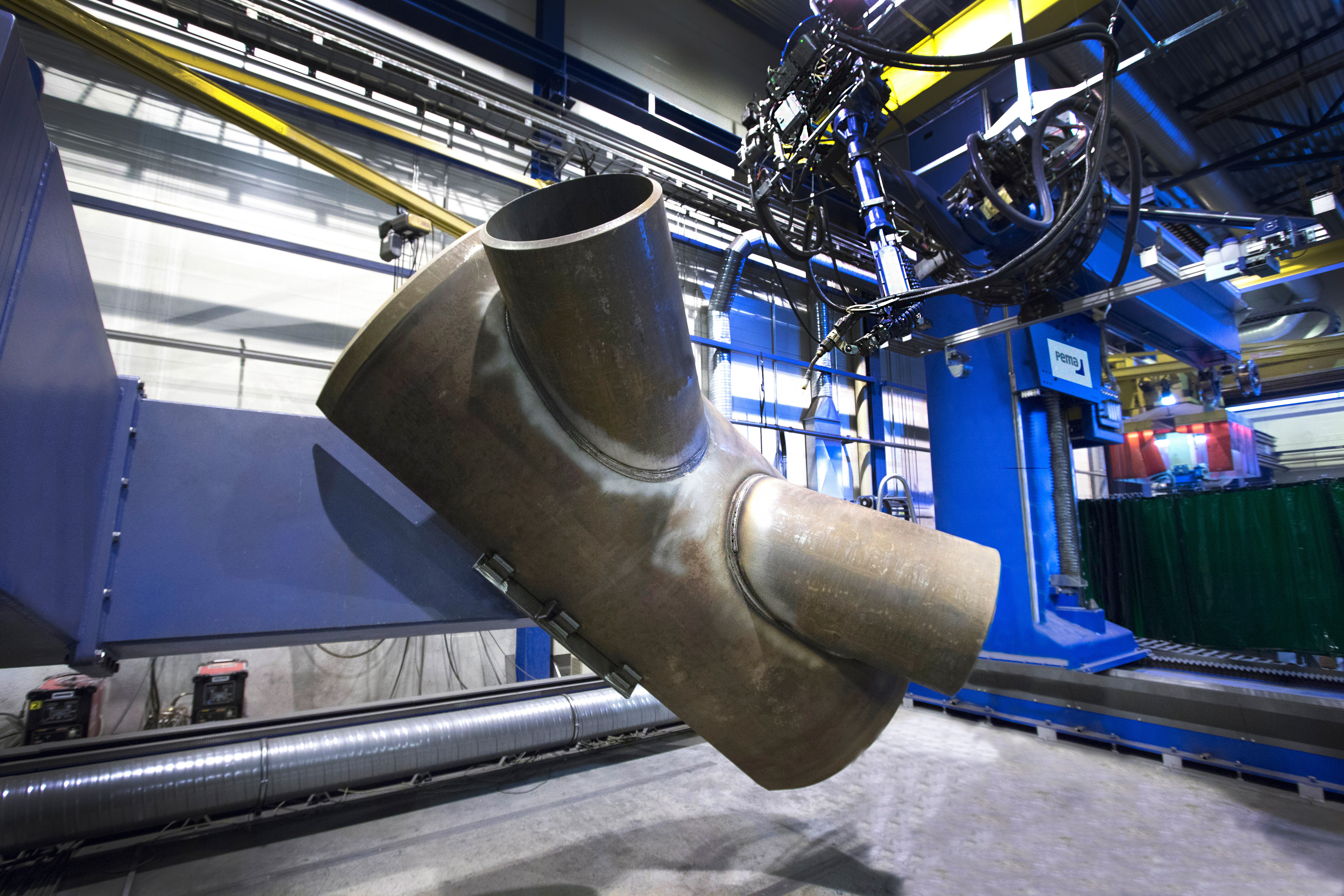 Automation and robotics transform wind tower manufacturing image